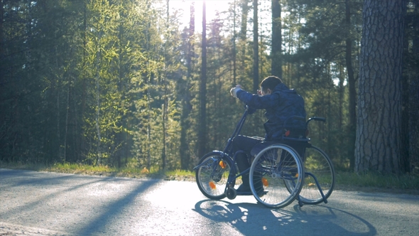 Process of a Physically Challenged Man in a Training Wheelchair