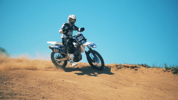 Rider on His Autobike Showing a Gesture