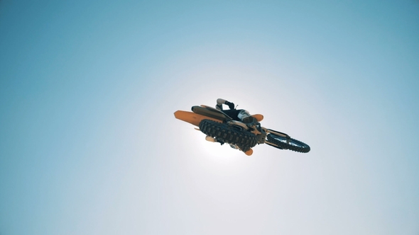 Panoramic View of the Sky with a Motorcyclist Flying Over It