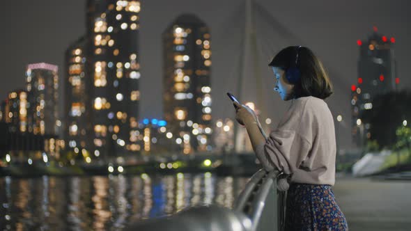 Girl Listening To Music At Night 