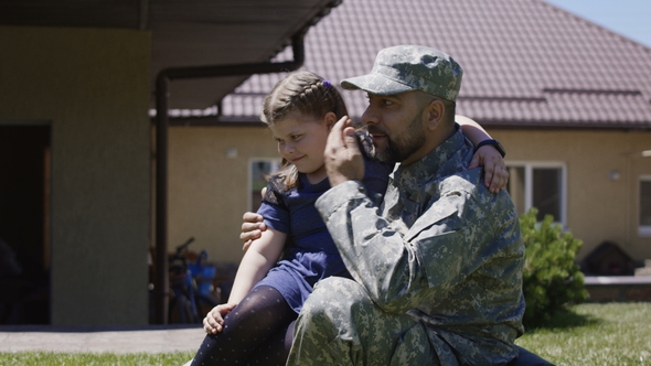 Man Spending Time with Children Before Army