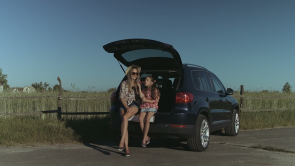 Family Enjoying Leisure in Nature During Road Trip