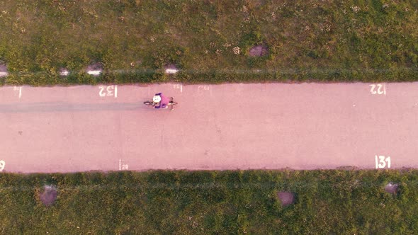 Boy On Bike with protective helmet Ride In Park