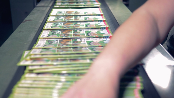 Piles of Magazines Go on an Assembly Line