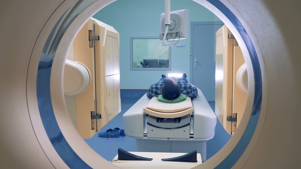 Patient Lying on the CT or MRI Scanner