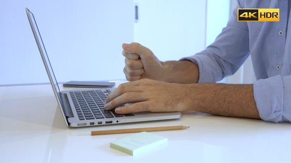 Journalist Typing On Computer