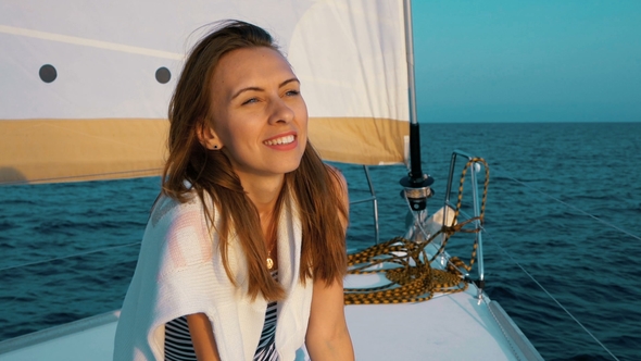 Woman on Sailboat Luxury Summer Lifestyle