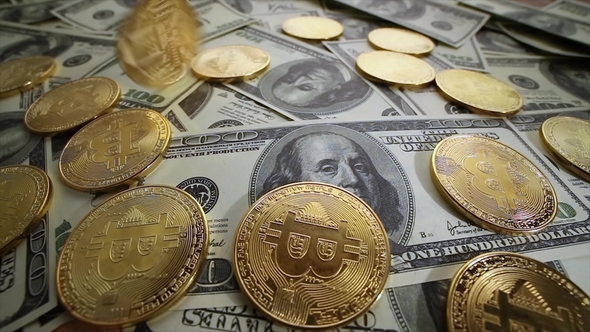 Gold Bit Coin BTC Coins and Dollar Bills.