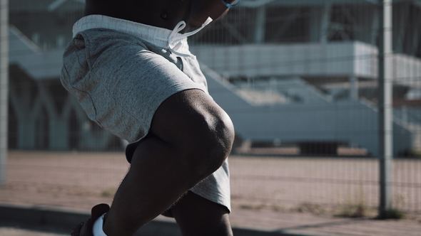 African American Athlete Man Warm Up Running on the Spot Outside