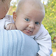 Mother is holding a baby in his arms. - VideoHive Item for Sale