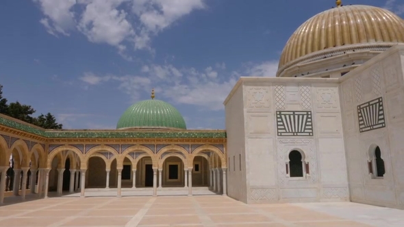 Colonnade with Arches and Entrance To Mausoleum Habib Bourguiba in Monastir City Tunisia. Dolly Shot