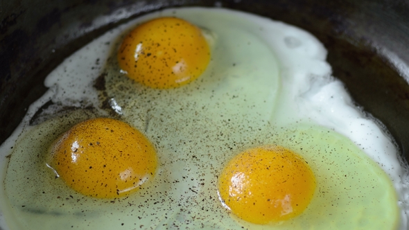 Preparation of Three Fried Eggs