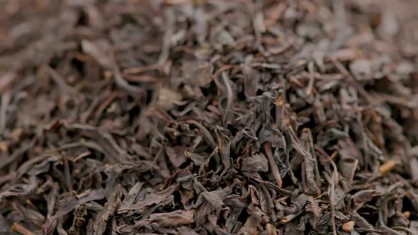 Looped Spinning Dry Black Tea Full Frame Closeup Background