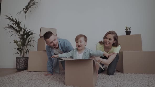 A Happy Family Moves To a New Apartment.