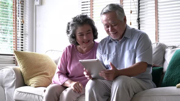 Senior using tablet