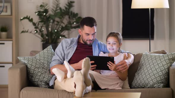 Father and Daughter with Tablet Pc at Home 25