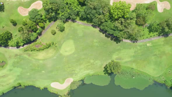 green golf course in Thailand Beautiful green grass and trees on a golf field with fairway