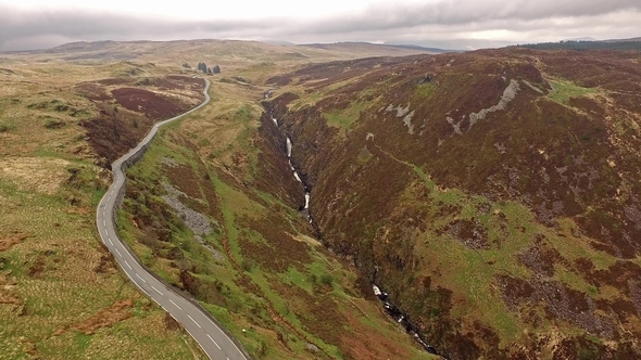 Aerial View of the B4391 Through the Moor and Mountains of Wales Close To Waterfall, United Kingdom