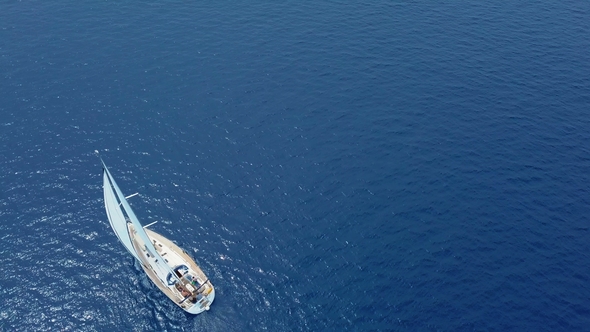 Yacht Sailing on Opened Sea. Sailing Boat. Yacht From Drone. Yachting Video. Yacht From Above