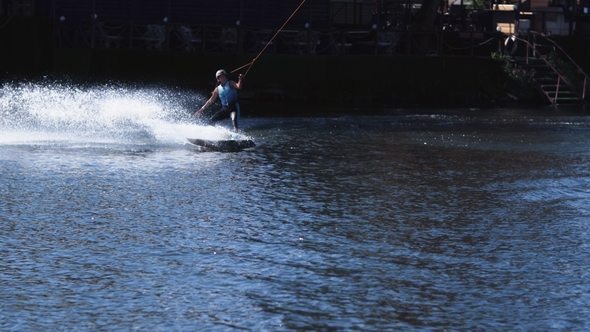 Extreme Woman Wakeboarding on Water of Sports Complex, Female Extreme Lifestyle