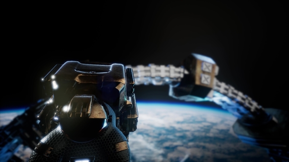 Astronaut and International Space Station alt