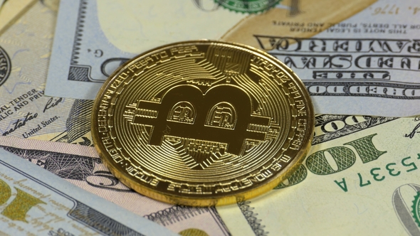 Gold Bitcoin Coin, BTC and Bills of Dollars Are Rotating