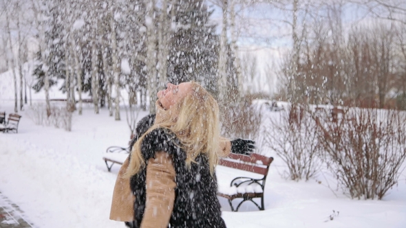 Laughing Young Woman Having Fun in Winter Park.