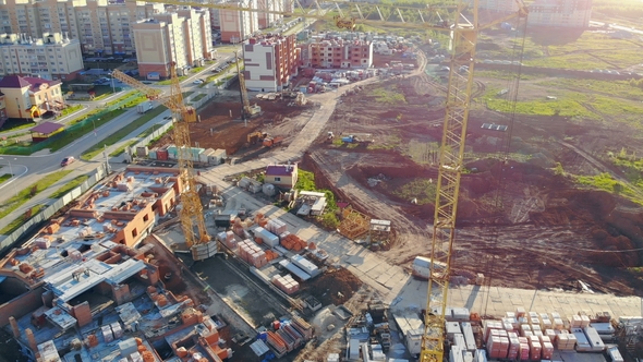 Unfinished Houses on a Construction Site. Real Estate Concept. alt