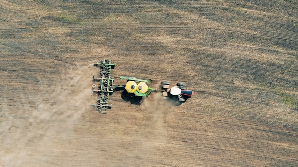 Meadow Is Getting Scattered with Seeds By a Field Engine