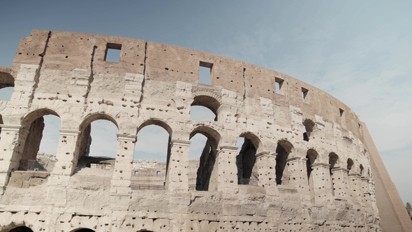 Ruins of the Roman Colosseum. Vehicles and People, Pan Shot