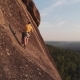 Aerial View of the People Climb To the Top of the Rock in the Siberian Nature Reserve Stolby. - VideoHive Item for Sale