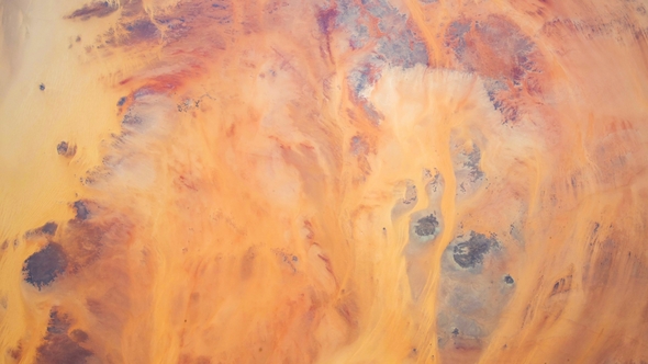 Flying Over the Earth on the ISS. Flying Over Desert, Aerial View From Space.