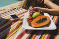 Relaxing by the pool with fresh fruit. - PhotoDune Item for Sale