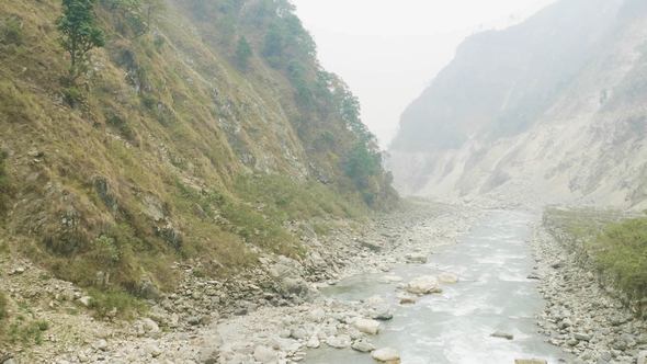 River Between Nepalese Mountains. Manaslu Circuit Trek.