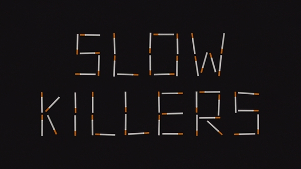 Slow Killers Words Written with Moving Cigarettes. Quit Smoking Concept in Stop Motion Animation alt