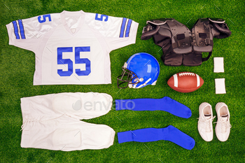  with ball, shirt, helmet and protective pads.