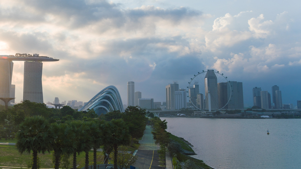 Buildings In City At Sunrise