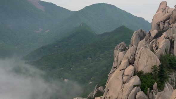 Young Female Blonde Traveler Enjoying Ulsanbawi Rock View