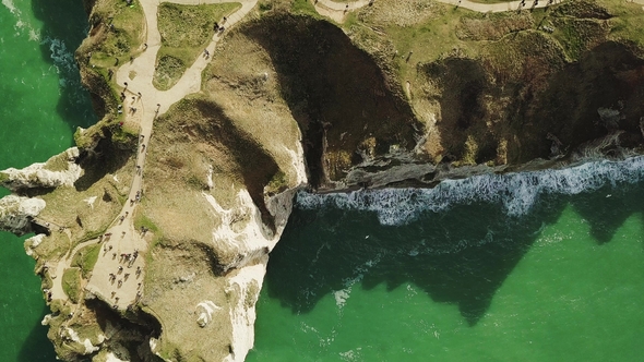 Drone Footage of a Sea Coast with Waves Hitting the Beach. Etretat, d'Etretat