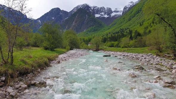 Flying Over Mountain River in Slovenia at Spring