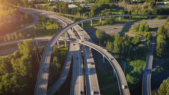 Drone Hyperlapse Over Cars Driving On Freeway Interchange In North America