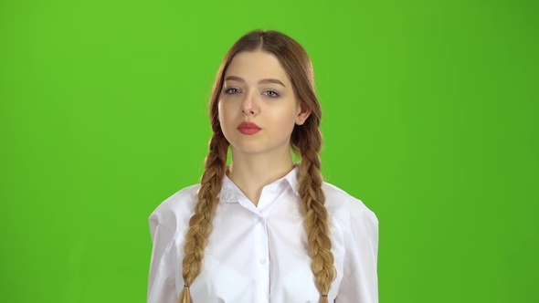 Student in a White Blouse and Pigtails