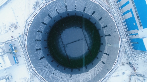 Operating Cooling Tower Among Station at Snowfall