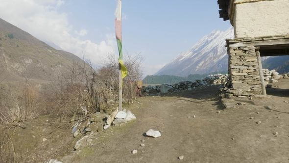 Local Farmers Carry Heavy Wicker Baskets on the Heads in Nepal. Manaslu Area