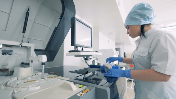 A Nurse Packs Tubes with Blood alt