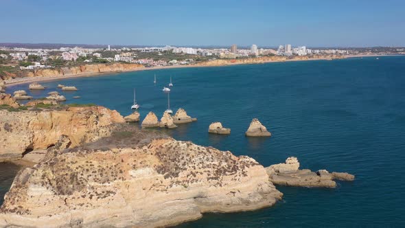 Aerial View Drone Footage of Alemao Beach Vao the Portuguese Algarve Coast and Holidaymakers