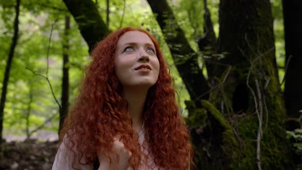 Woman in Forest Enjoying Nature