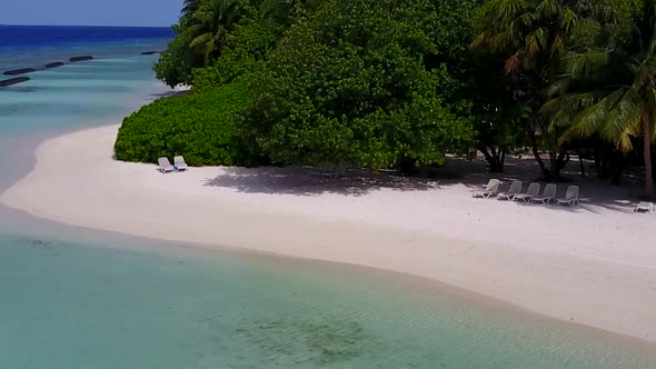 Aerial drone scenery of tourist beach voyage by blue ocean and sand background