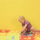Baby girl playing with toy alphabet letters - VideoHive Item for Sale