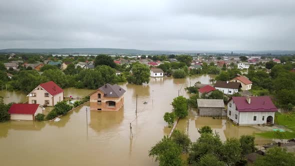Aerial view of flooded houses with dirty water of Dnister river in Halych town, western Ukraine. alt